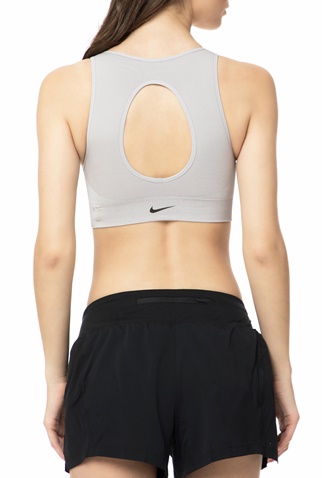 NIKE-Γυναικείο αθλητικό μπουστάκι NIKE SEAMLESS BRALETTE γκρι 